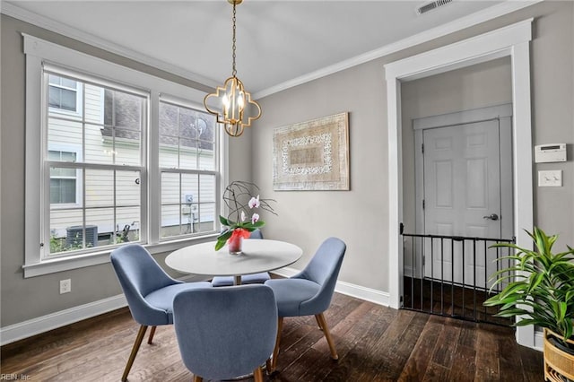 624 Mill Creek Pkwy, Chesapeake, VA 23323 - dining room featuring wood finished floors, baseboards, a chandelier, and ornamental molding
