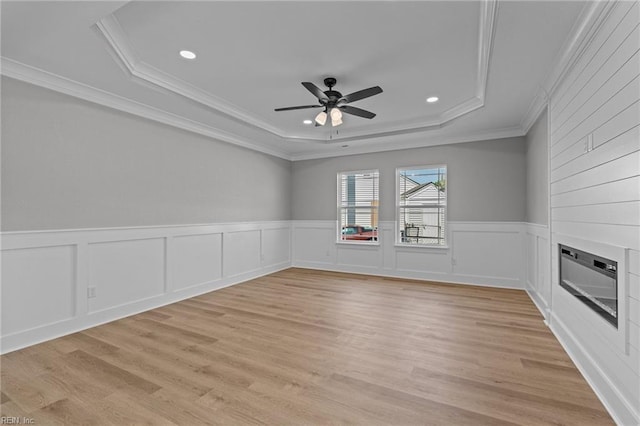 4 Roundtree Cir, Hampton, VA 23661 - unfurnished room featuring a tray ceiling, ornamental molding, ceiling fan, a large fireplace, and recessed lighting