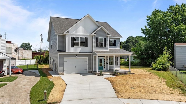 4 Roundtree Cir, Hampton, VA 23661 - craftsman-style house featuring roof with shingles, a porch, board and batten siding, concrete driveway, and a garage
