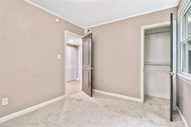 112 Atwell Ln, Hampton, VA 23669 - unfurnished bedroom featuring carpet flooring, crown molding, a closet, and baseboards
