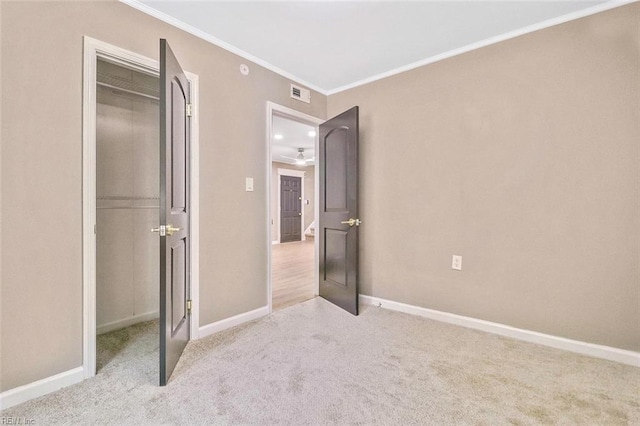 112 Atwell Ln, Hampton, VA 23669 - unfurnished bedroom with carpet flooring, ornamental molding, baseboards, and a closet