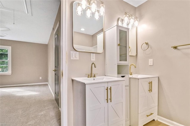 112 Atwell Ln, Hampton, VA 23669 - bathroom featuring baseboards and two vanities