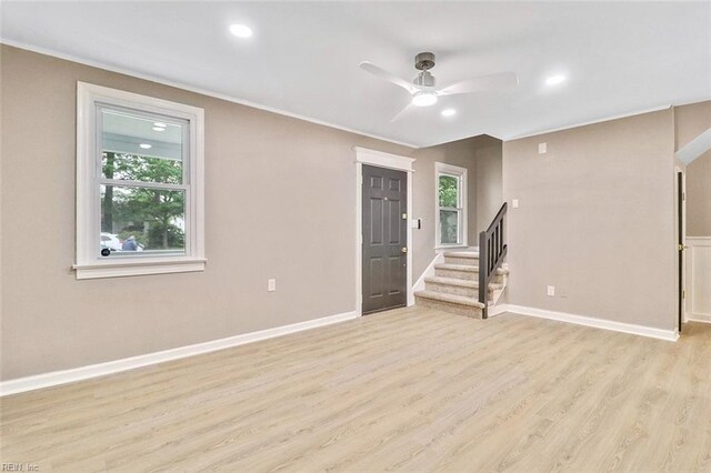 112 Atwell Ln, Hampton, VA 23669 - unfurnished living room with stairs, plenty of natural light, a ceiling fan, light wood-style flooring, and recessed lighting