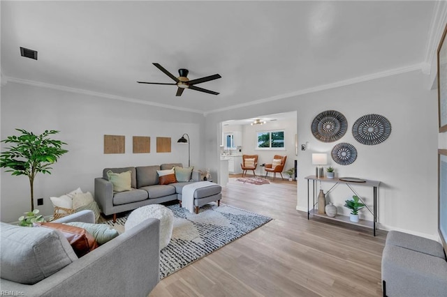 2920 Fetsch Pl, Virginia Beach, VA 23453 - living area with a ceiling fan, light wood-style flooring, crown molding, and baseboards
