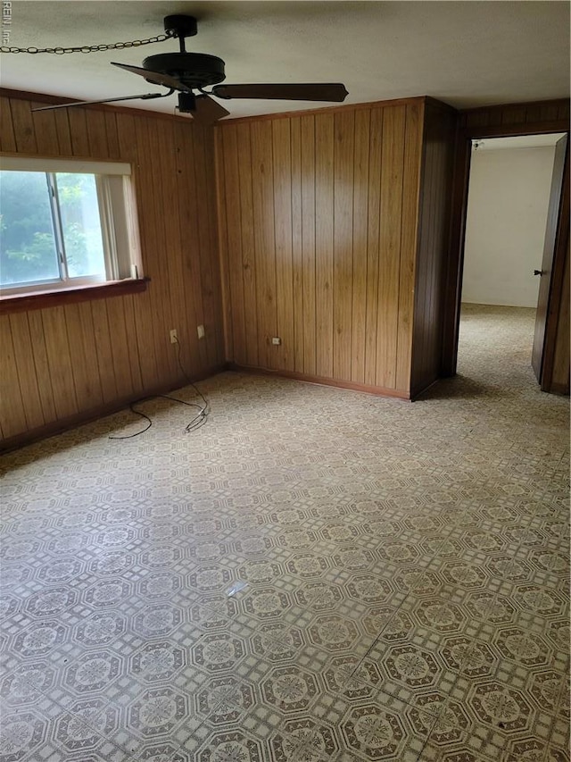 536 Longfellow Ave, Virginia Beach, VA 23462 - spare room featuring ceiling fan, wooden walls, and baseboards