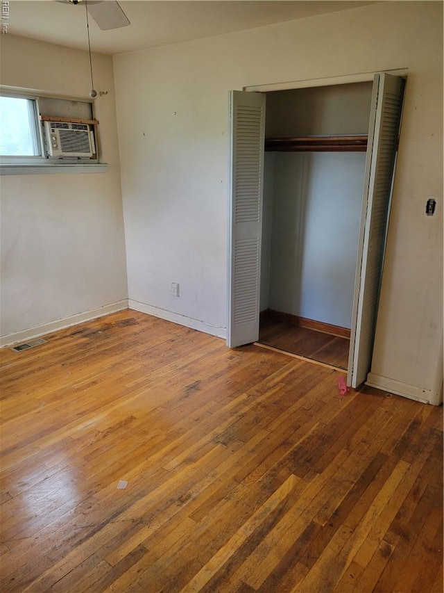 536 Longfellow Ave, Virginia Beach, VA 23462 - unfurnished bedroom with hardwood / wood-style floors, a closet, and baseboards