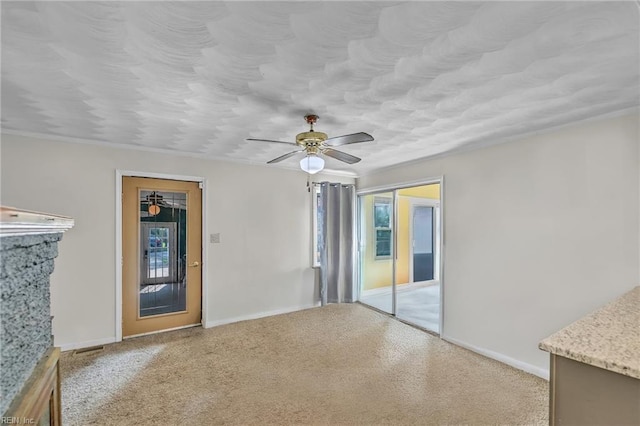 8248 Andrew Ln, Norfolk, VA 23505 - unfurnished room with plenty of natural light, baseboards, carpet, ceiling fan, and a textured ceiling