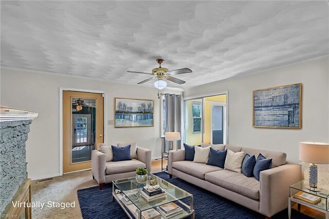 8248 Andrew Ln, Norfolk, VA 23505 - living area with healthy amount of natural light, carpet, and a ceiling fan
