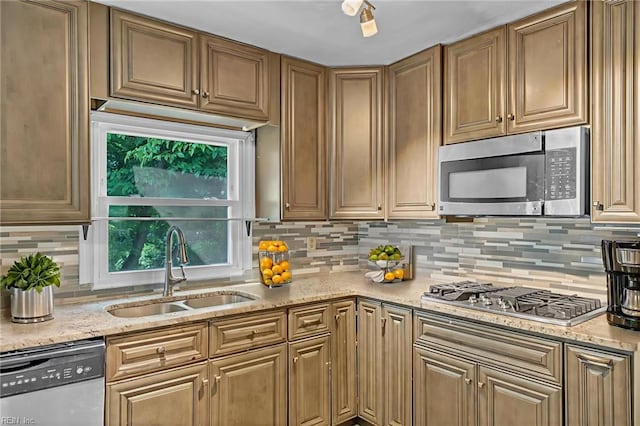 8248 Andrew Ln, Norfolk, VA 23505 - kitchen featuring stainless steel appliances, a sink, tasteful backsplash, and light stone counters
