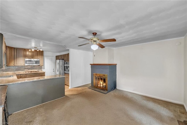 8248 Andrew Ln, Norfolk, VA 23505 - unfurnished living room featuring light carpet, a brick fireplace, ceiling fan, and baseboards