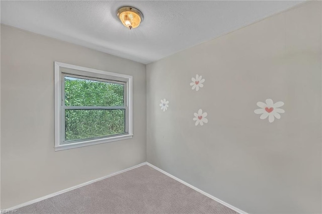8248 Andrew Ln, Norfolk, VA 23505 - carpeted spare room with baseboards and a textured ceiling