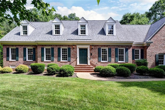2116 Harpers Ml, Williamsburg, VA 23185 - new england style home featuring a front yard, brick siding, roof with shingles, and entry steps