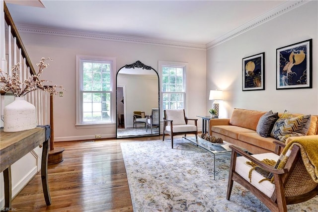 2116 Harpers Ml, Williamsburg, VA 23185 - living area featuring wood finished floors, crown molding, baseboards, and stairway
