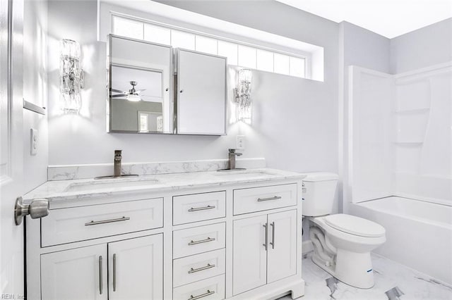 3502 Goodwin Neck Rd, Yorktown, VA 23692 - bathroom featuring double vanity, toilet, marble look tile flooring, ceiling fan, and washtub / shower combination