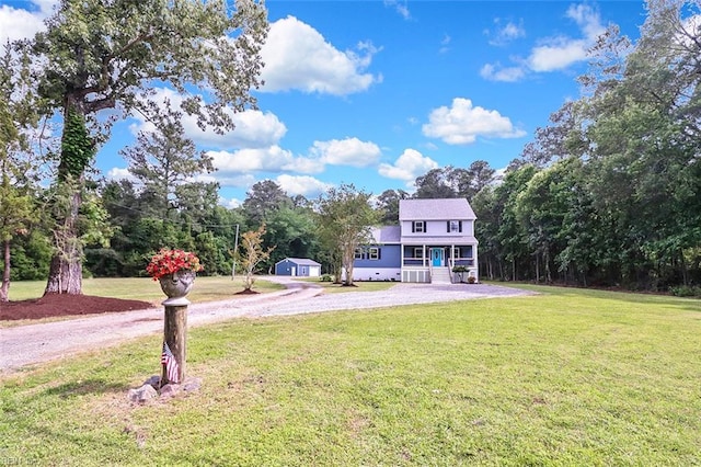 3502 Goodwin Neck Rd, Yorktown, VA 23692 - view of grassy yard with driveway, covered porch, and central AC
