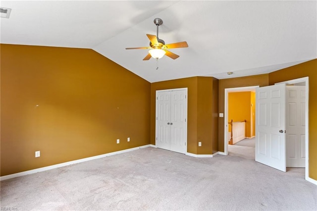 10 Musket Ln, Hampton, VA 23666 - unfurnished bedroom with carpet flooring, vaulted ceiling, a closet, and a ceiling fan
