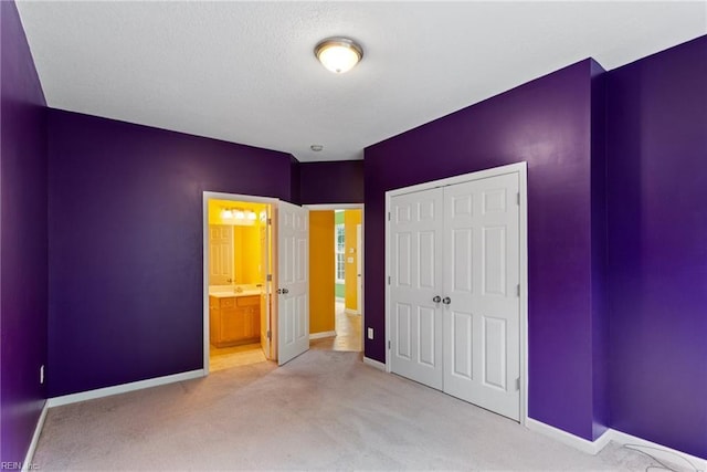 10 Musket Ln, Hampton, VA 23666 - unfurnished bedroom featuring carpet floors, a closet, and ensuite bathroom
