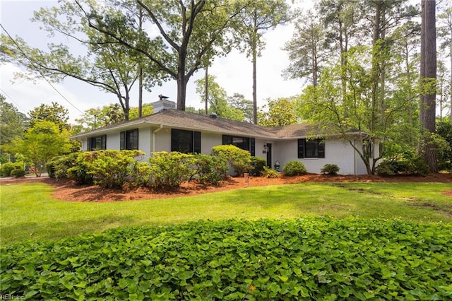 1301 Penguin Cir, Virginia Beach, VA 23451 - view of front of property with brick siding, a front yard, and a chimney