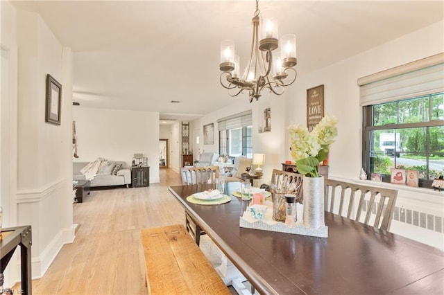 1301 Penguin Cir, Virginia Beach, VA 23451 - dining area with light wood-style floors and a chandelier