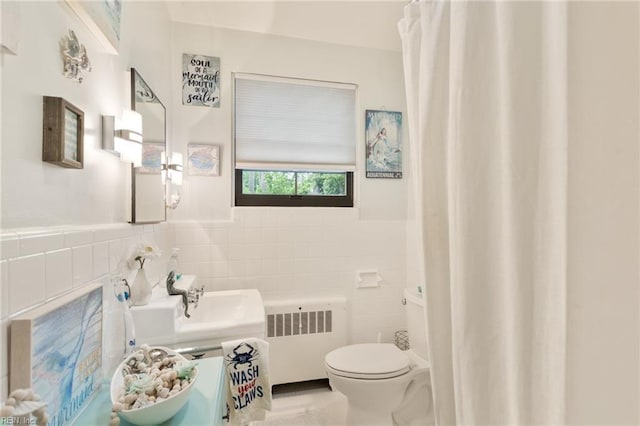 1301 Penguin Cir, Virginia Beach, VA 23451 - full bath featuring radiator, tile walls, and a wainscoted wall