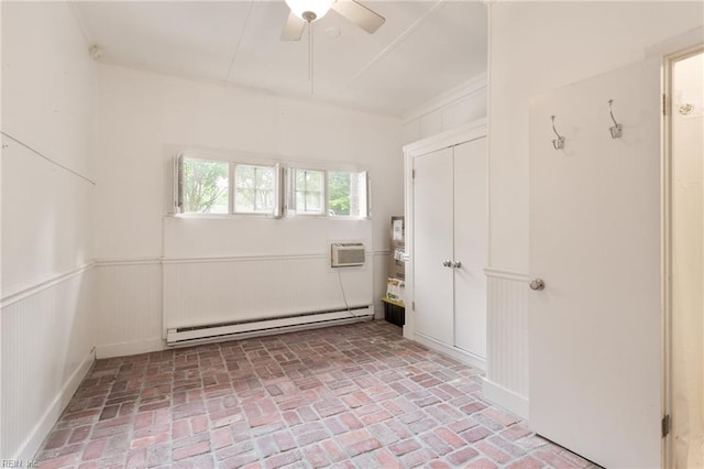 1301 Penguin Cir, Virginia Beach, VA 23451 - unfurnished room with a baseboard heating unit, brick flooring, wainscoting, an AC wall unit, and a ceiling fan
