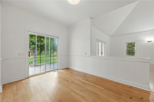 5308 Doral Woods Ct, Suffolk, VA 23435 - unfurnished room with plenty of natural light, wood finished floors, baseboards, crown molding, and lofted ceiling