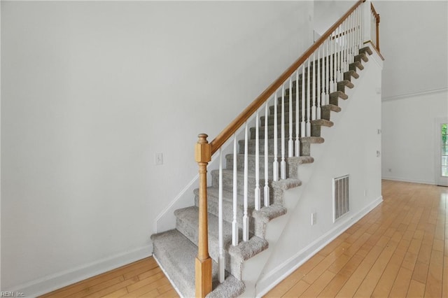 5308 Doral Woods Ct, Suffolk, VA 23435 - staircase with hardwood / wood-style flooring and baseboards