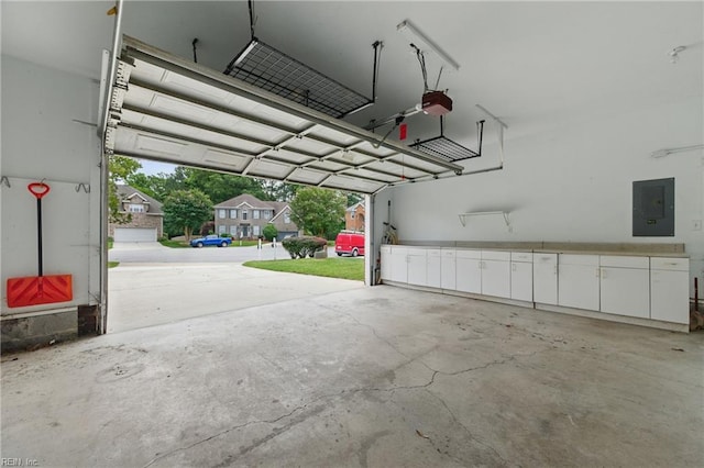 5308 Doral Woods Ct, Suffolk, VA 23435 - garage with electric panel and a garage door opener