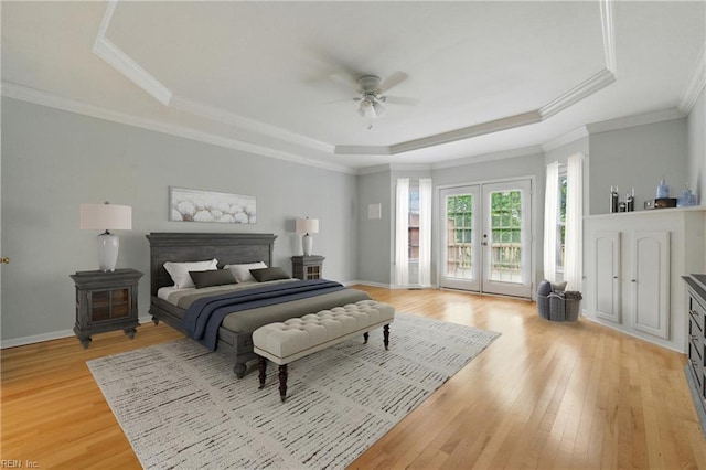 5308 Doral Woods Ct, Suffolk, VA 23435 - bedroom with a raised ceiling, light wood-style floors, access to exterior, french doors, and a ceiling fan