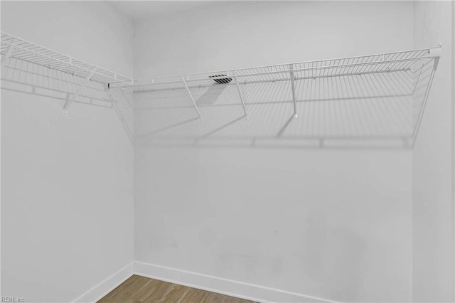 6945 Healy Ave, Gloucester, VA 23061 - spacious closet with wood finished floors