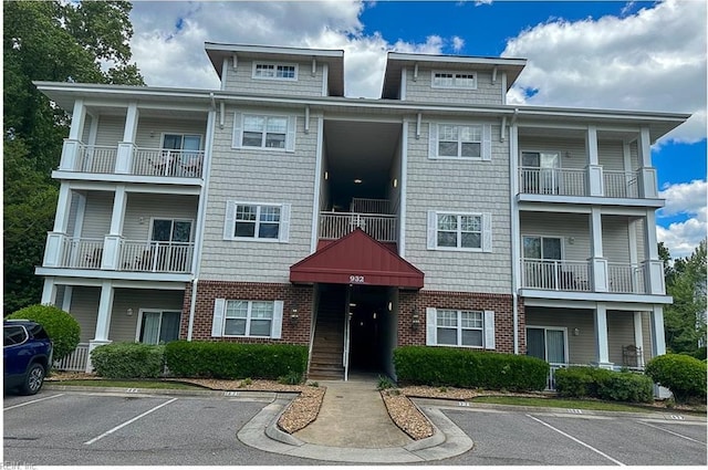 932 Southmoor Dr Unit 105, Virginia Beach, VA 23455 - view of property with uncovered parking