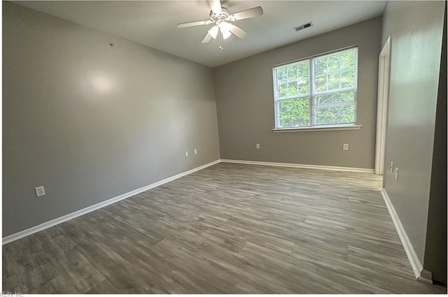 932 Southmoor Dr Unit 105, Virginia Beach, VA 23455 - spare room featuring a ceiling fan, baseboards, and wood finished floors