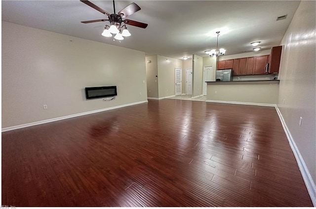 932 Southmoor Dr Unit 105, Virginia Beach, VA 23455 - unfurnished living room with dark wood-style floors, a chandelier, ceiling fan, and baseboards