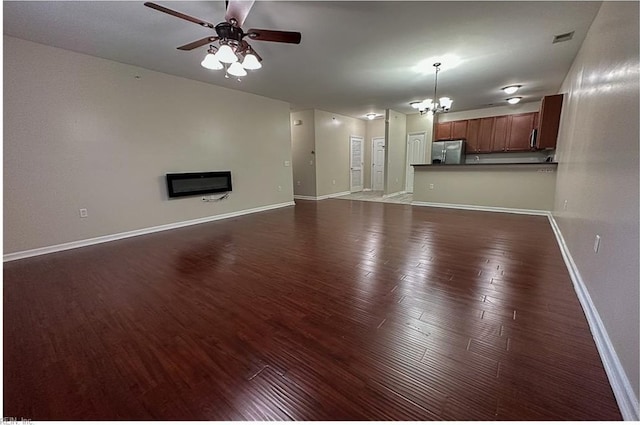 932 Southmoor Dr Unit 105, Virginia Beach, VA 23455 - unfurnished living room with dark wood-style flooring, baseboards, a chandelier, and a ceiling fan