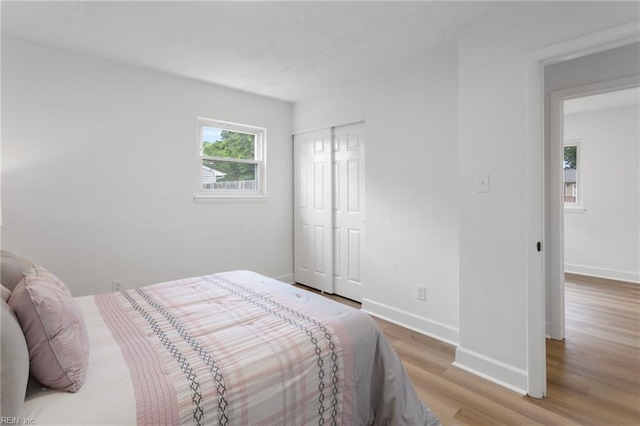 3421 Stancil St, Virginia Beach, VA 23452 - bedroom with light wood finished floors, baseboards, and a closet