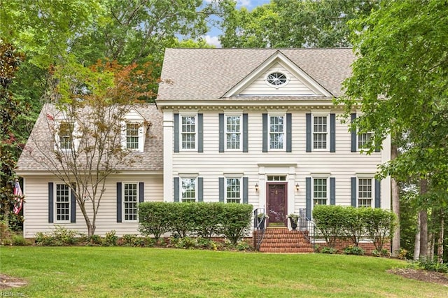107 Gullane, Williamsburg, VA 23188 - georgian-style home featuring a front yard and roof with shingles