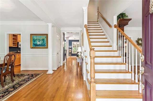 107 Gullane, Williamsburg, VA 23188 - stairway with wood finished floors, crown molding, and ornate columns