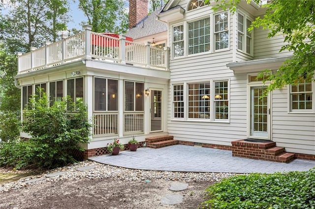 107 Gullane, Williamsburg, VA 23188 - back of house featuring a balcony, a sunroom, and a patio area