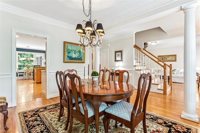 107 Gullane, Williamsburg, VA 23188 - dining area with decorative columns, crown molding, light wood-type flooring, a chandelier, and stairway