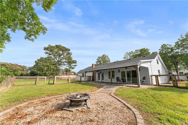 2652 Benefit Rd, Chesapeake, VA 23322 - back of house with a fire pit, a ceiling fan, a fenced backyard, and a patio area