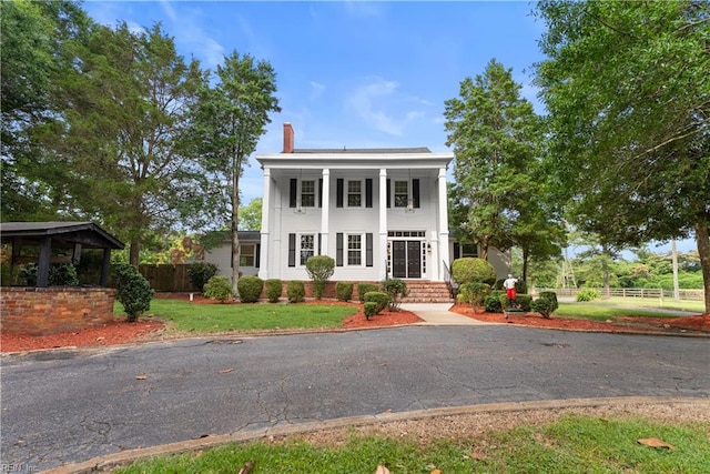 2652 Benefit Rd, Chesapeake, VA 23322 - greek revival house featuring a chimney