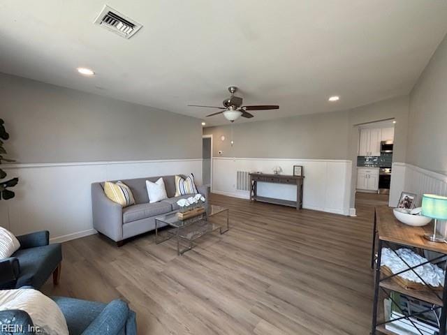 913 B St, Virginia Beach, VA 23451 - living area with a ceiling fan, wood finished floors, a wainscoted wall, and recessed lighting