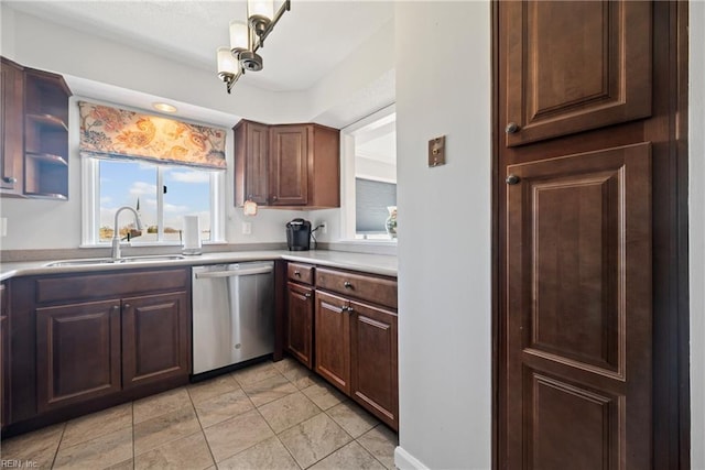 7501 River Rd Unit 4A, Newport News, VA 23607 - kitchen featuring stainless steel dishwasher, a sink, light countertops, and light tile patterned floors