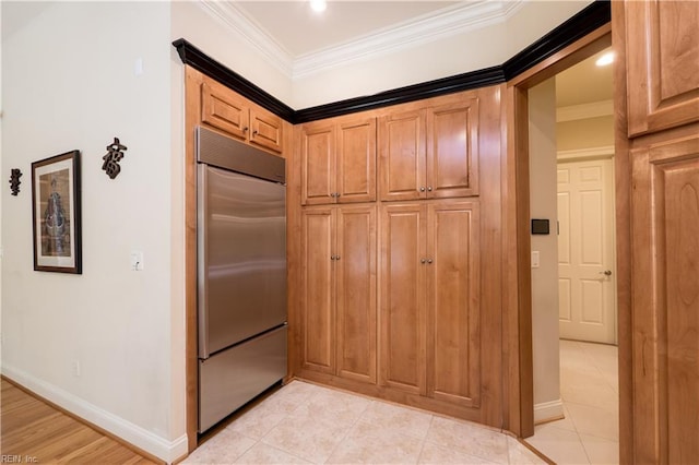 5225 Regatta Pointe Rd, Suffolk, VA 23435 - kitchen with stainless steel built in fridge, crown molding, baseboards, and light tile patterned floors