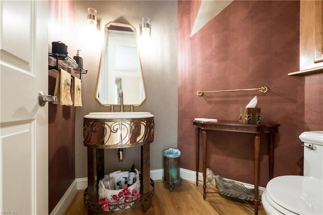 5225 Regatta Pointe Rd, Suffolk, VA 23435 - half bathroom with toilet and wood finished floors