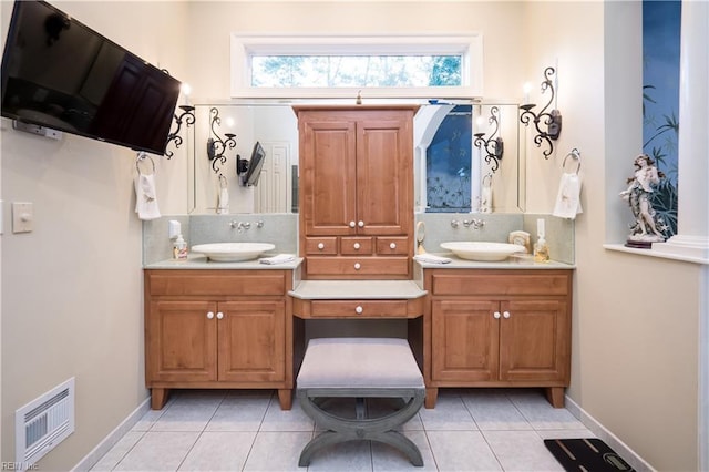 5225 Regatta Pointe Rd, Suffolk, VA 23435 - bathroom with double vanity, tile patterned flooring, and baseboards
