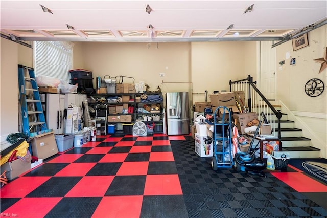 5225 Regatta Pointe Rd, Suffolk, VA 23435 - garage featuring stainless steel refrigerator with ice dispenser