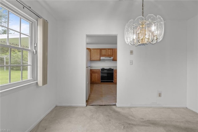 1120 Sean Dr, Chesapeake, VA 23323 - unfurnished dining area with a chandelier, light carpet, and baseboards
