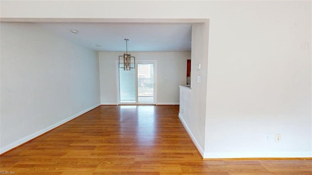 400 Ticonderoga Rd, Virginia Beach, VA 23462 - empty room with a chandelier and light wood-style floors