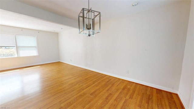 400 Ticonderoga Rd, Virginia Beach, VA 23462 - empty room featuring a chandelier and wood finished floors